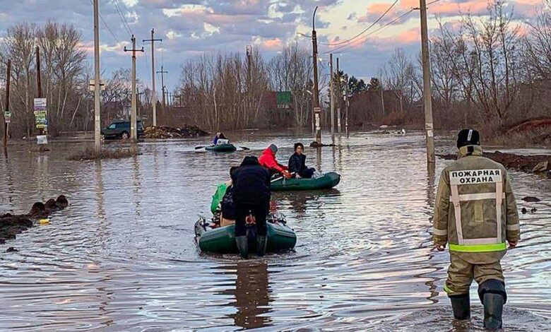 Russia after flooding in and around the area caused by a burst in a section of an embankment dam in the city of Orsk late Friday.