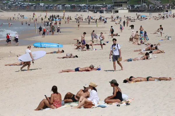 Australian police confirmed an ongoing security operation at Sydney’s Bondi Beach after gunshots, urging the public to avoid the area.