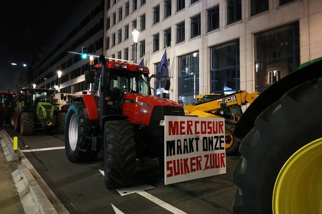 Farmers blocked Brussels roads with tractors during an EU summit, protesting the Mercosur deal they say threatens agriculture.