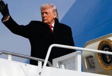 Trump posts an image of himself planting a U.S. flag by a “Greenland, U.S. Territory, Founded 2026” sign, with Vance and Rubio.