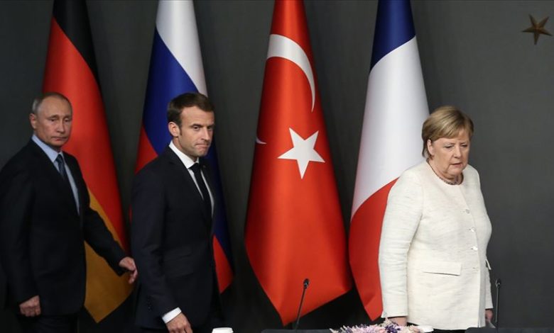 merkel macron putin