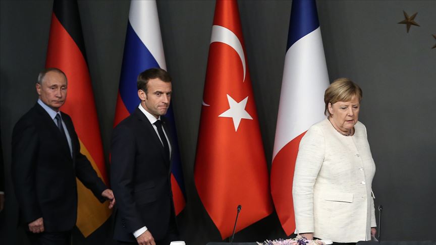 merkel macron putin